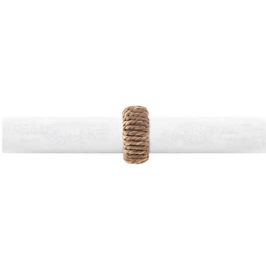 Mesa posta com argola de guardanapo Complement Fiber, em um guardanapo de tecido, ao lado de pratos e talheres.